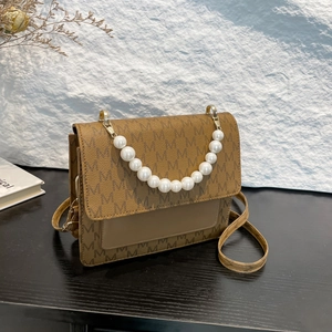 Vintage letter print crossbody bag with pearl handle and leather stitching detail