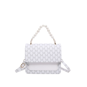 Vintage white pearl handle handbag with monogram M pattern and gold hardware