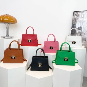 Sacs à main trapèze minimalistes en six couleurs avec poignées et fermoir rotatif en métal
