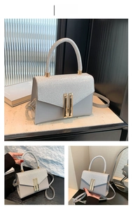 Detailed view of silver sequin patchwork handbag with golden metallic clasp and leather body