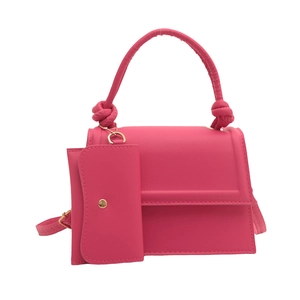 Chic magenta PU leather shoulder bag with matching mini purse and knotted handle detail
