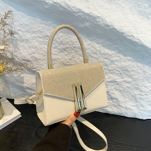 Elegant warm white handbag with champagne gold glitter sequins and metal buckle