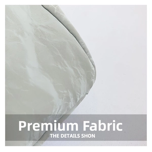 Macro detail of high-quality quilted fabric and stitching on a large tote shoulder bag