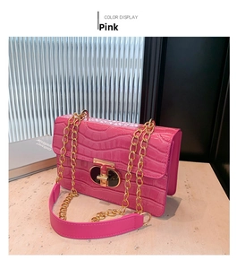 Pink croc-embossed square bag with gold chain strap and stylish circular lock detail
