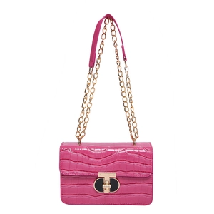 Pink crocodile-embossed chain crossbody bag with gold-tone twist lock closure for women