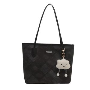 Black quilted tote bag with large capacity and cute cloud charm on white background