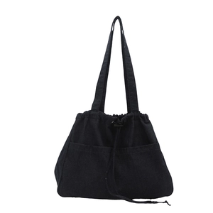 Minimalist black denim drawstring bucket bag with large capacity and multi-pockets
