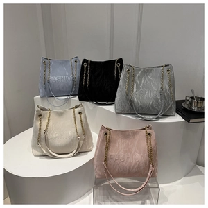 Chic pleated leather tote bag with metal chain strap and embossed FASHION lettering