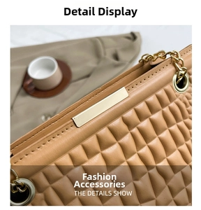 Close-up of quilted leather texture and gold chain strap on pink crossbody bag