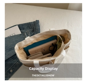 Internal view of beige canvas tote bag showing large capacity for tablet and daily items