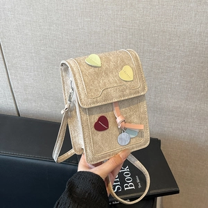 Sweet cream mini shoulder bag with colorful heart patches and stylish silver charm
