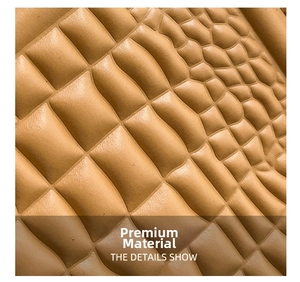 Detailed macro shot of premium synthetic leather with geometric embossed texture and quilting