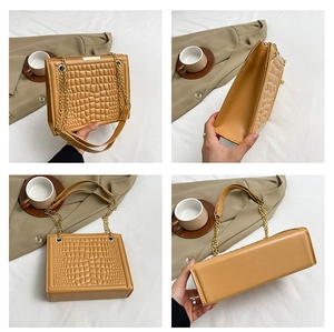 Detail views of brown faux leather tote with crocodile texture and gold chain straps