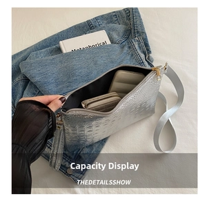 Top view of the silver crocodile pattern bag interior showing daily storage capacity