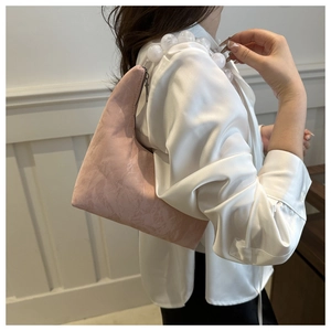 Pink crescent underarm bag with unique transparent beaded strap and metallic zipper