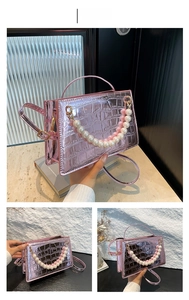 Detailed views of pink crocodile embossed handbag with pearl handle and metallic finish
