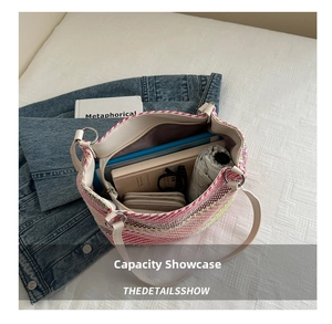 Spacious interior of colorful striped woven tote bag showing large storage capacity
