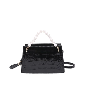 Elegant black faux crocodile skin handbag with pearl handle and golden hardware accessories
