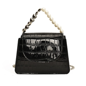Mini black crocodile embossed flap crossbody bag with pearl and heart chain handle