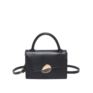 Minimalist black leather square handbag with golden geometric clasp and adjustable strap
