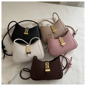 Group view of leather half-moon crossbody bags in five colors with golden geometric buckles