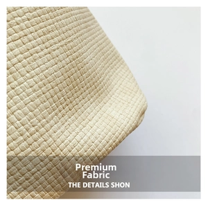 Macro detail of high-quality woven beige fabric texture with minimalist craft pattern