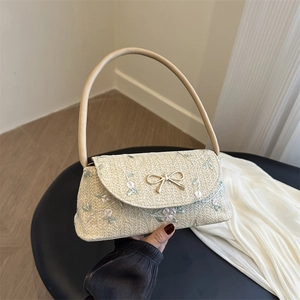 Sac à bandoulière en paille brodé de fleurs avec boucle nœud doré pour femme