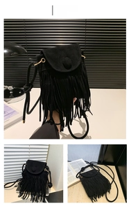 Detail of black suede crossbody bag with long fringes and retro bohemian tassel styling