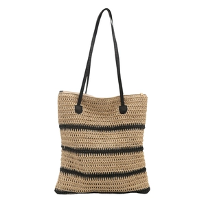 Minimalist straw tote bag with black stripes and leather straps for summer vacations