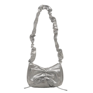 Silver metallic crescent shoulder bag with large bow and pleated strap for women