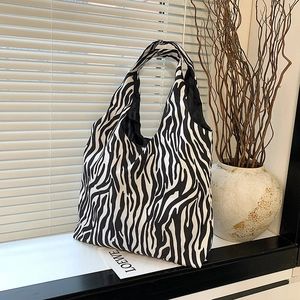 Fashionable zebra print canvas tote bag with large capacity for daily casual use