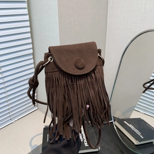 Bohemian brown suede shoulder bag with fringe tassels and crossbody strap design