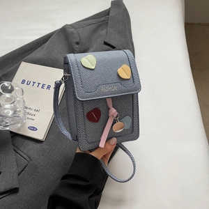 Blue denim mini crossbody bag with colorful heart patches and fashion print