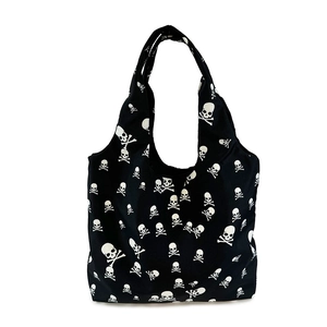 Black canvas bucket tote bag with white skull prints and large capacity for daily use