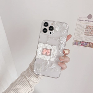 Transparent iPhone case featuring 3D resin butterflies, roses and pearl chain design