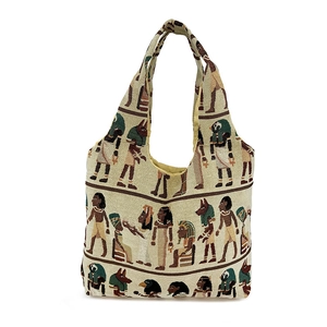Beige geweven emmertas met Oud-Egyptische muurschildering en brede handvaten erop