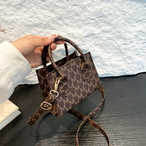 Retro brown mini tote bag with letter M monogram pattern and detachable strap