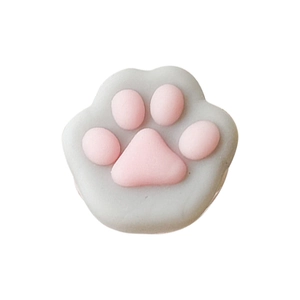 Cute 3D cat paw expanding phone socket stand with pink silicone pad on grey base