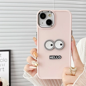 Pink silicone iPhone case with big cartoon eyes and HELLO text held in hand
