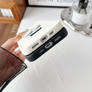 Detailed bottom view of silicone iPhone case showing precise port cutouts and 3D cartoon eyes