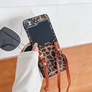 Leopard print Samsung Galaxy Z Flip case with Aquarius gold script and crossbody strap