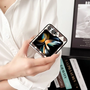 Detail of checkered faux leather phone case with gold camera frame for Z Flip