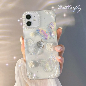 Clear iPhone case featuring 3D laser butterflies, camellia flowers and pearl camera ring