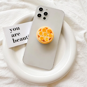 3D food-shaped phone grip featuring realistic steamed shumai dumplings in a bamboo steamer