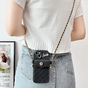 Black quilted leather iPhone case with crossbody chain and gold camellia flower wallet