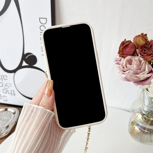 Detail of cream white iPhone case featuring metal woven chain strap and camera protection
