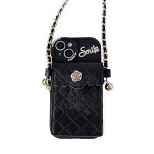 Black quilted leather iPhone case with camellia flower button and cross-body chain strap