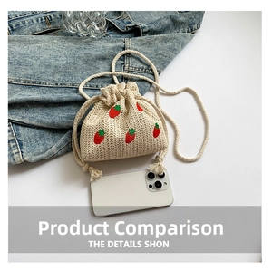 Mini straw bucket bag with strawberry embroidery and smartphone for size scale