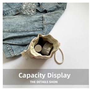 Detail view of woven bucket bag interior showing capacity for cosmetics and skincare