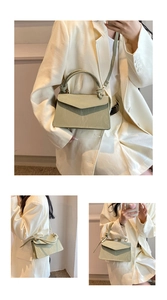 Close-up of light green crossbody bag with textured leather surface and round handle